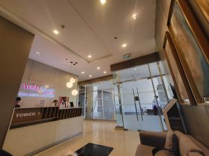 a view of a shopping mall with a store at Cozy City Escape - Avida Aspira Tower 1, CDO in Cagayan de Oro