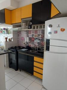 Køkken eller tekøkken på Condominio Mirante do Lago