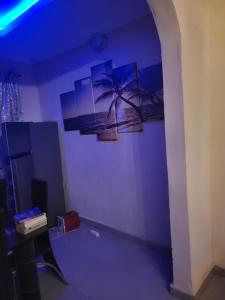 TV a/nebo společenská místnost v ubytování Edo Home