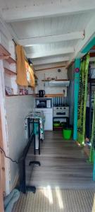 Кухня или мини-кухня в Casa Nido Tiny House
