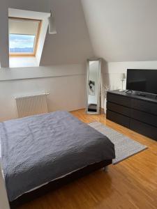 Postel nebo postele na pokoji v ubytování Bled lux apartment