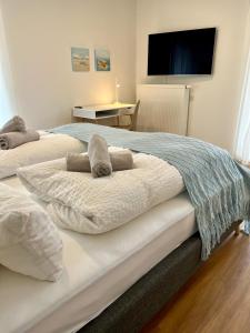 Postel nebo postele na pokoji v ubytování bloom - Zentral, modern, großzügig für 1-6 Pers
