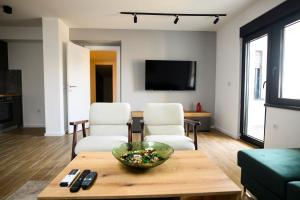 Foto sihtkohas Niš asuva majutusasutuse Premium L&L Apartments Modern Designer Stay with Spa Vibe galeriist