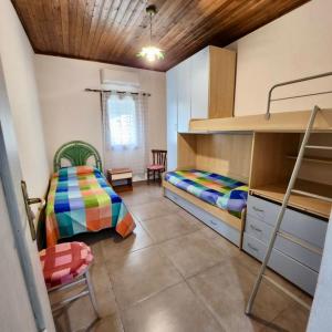 Postel nebo postele na pokoji v ubytování Casa Osala