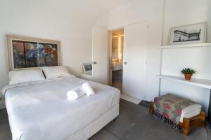 Ένα ή περισσότερα κρεβάτια σε δωμάτιο στο Espectacular Casa con vistas panorámicas y WIFI