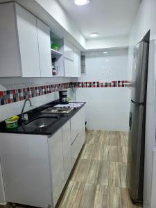 Kuchyň nebo kuchyňský kout v ubytování Amoblado Norte oncológico CTIC