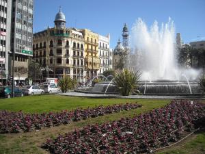 
a large fountain in the middle of a city at Casual Vintage Valencia in Valencia
