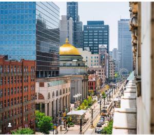 a view of a city street with a gold dome at Cozy Buffalo Getaway Minutes to Downtown & Bills Stadium in Buffalo