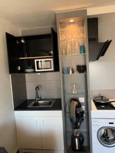 Kuchyňa alebo kuchynka v ubytovaní Résidence Port Soleil Bâtiment B3 - Studio 2 pers. - Résidence Port Soleil MAE-4634
