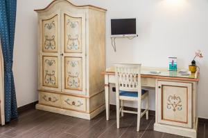 TV a/nebo společenská místnost v ubytování La Rada B&B