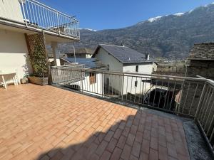 a balcony of a house with a view of a mountain at Casa Bruna in Vervio