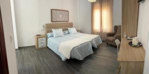 Posteľ alebo postele v izbe v ubytovaní Apartamento en Urbanización Residencial - Roble, 5