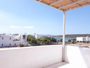 a balcony with a view of the ocean at Stavento Apartments in Aliki