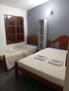 Katil atau katil-katil dalam bilik di Casa tinajas +3 gambar