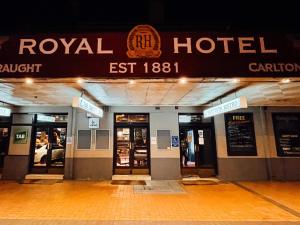 a hotel building with a hotel sign on it at Royal Hotel Oberon in Oberon