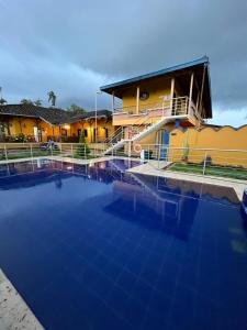 Bazén v ubytování Ecohotel Guaduales Nature nebo v jeho okolí