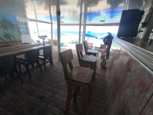 Restaurace v ubytování HOSTAL LAMAR BARU dónde Gertrudis