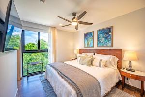 Ένα ή περισσότερα κρεβάτια σε δωμάτιο στο Torres del Mar oceanview 6th-floor two-bedroom condo +36 φωτογραφίες