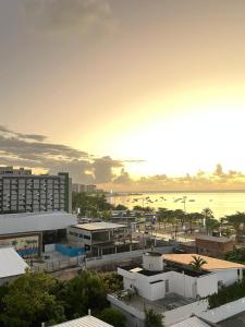 a view of a city with buildings and the ocean at Residencial Neo 1 in Maceió