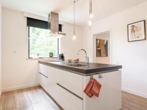 Kuchyň nebo kuchyňský kout v ubytování Maison Clement
