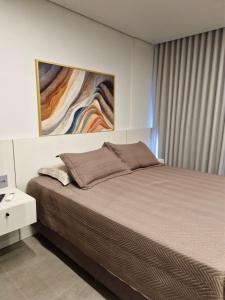 Postel nebo postele na pokoji v ubytování AP 511 - LIVIN Resort Atlântida