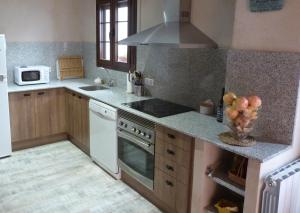 A kitchen or kitchenette at Cal Vibo