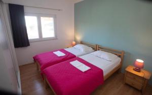 Katil atau katil-katil dalam bilik di Family friendly house with a swimming pool Selca, Brac - 23995 +16 gambar