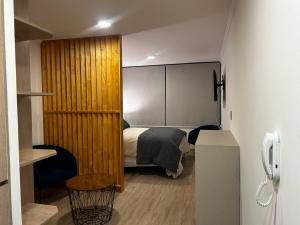 Postel nebo postele na pokoji v ubytování Modern studio in Concepción