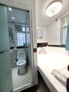 Kopalnica v nastanitvi Apple Hostel 蘋果賓館
