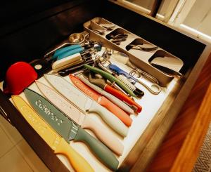 a drawer filled with lots of different types of scissors at Equipetrol-Chic 2BR Apt King Beds, Fast WiFi, Pool, Top Location & Café Scene in Santa Cruz de la Sierra