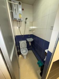 Kopalnica v nastanitvi Apple Hostel 蘋果賓館