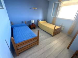 Ένα ή περισσότερα κρεβάτια σε δωμάτιο στο Maison Familiale sur la Côte Vermeille avec Climatisation et WIFI - FR-1-309-497