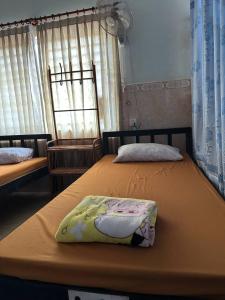Postel nebo postele na pokoji v ubytování Eco-Home Siem Reap Homestay