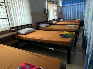Postel nebo postele na pokoji v ubytování Eco-Home Siem Reap Homestay