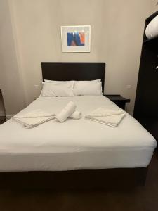 Postel nebo postele na pokoji v ubytování Green Ariana Hotel - near Wembley and central London