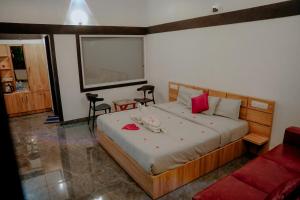 Letto o letti in una camera di Wildside Wayanad