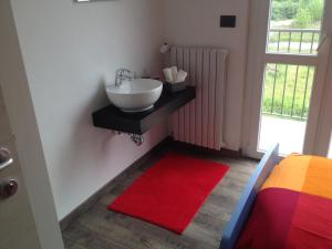 Postel nebo postele na pokoji v ubytování Grandi Cime Guest House