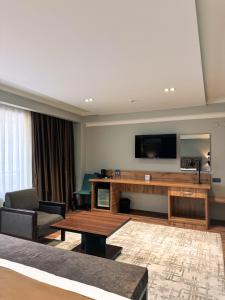 Телевизор и/или развлекательный центр в Ziyorat Luxury Hotel