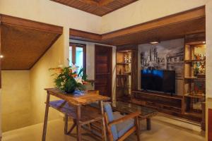 TV a/nebo společenská místnost v ubytování Rama Phala Resort & Spa