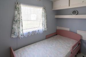CAMPING LES PAILLOTES客房内的一张或多张床位