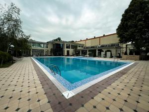Бассейн в Ziyorat Luxury Hotel или поблизости