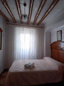 Posteľ alebo postele v izbe v ubytovaní Apartamento casa con vistas al campo y cocina con terraza