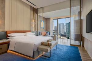 Katil atau katil-katil dalam bilik di Hilton Shanghai Zhangjiang Science City - Shuttle bus to Shanghai Disney Resort and Shanghai New International Expo Centre during exhibition period and 30 minutes drive to PVG