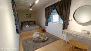 Postel nebo postele na pokoji v ubytování CofyHill Retreat + 37 fotografií