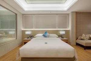 Huangshan Parkview International Hotel客房内的一张或多张床位