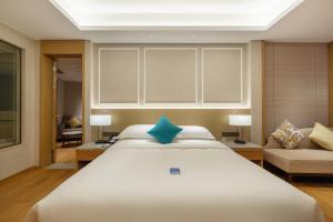 Huangshan Parkview International Hotel客房内的一张或多张床位