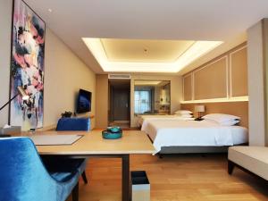 Huangshan Parkview International Hotel客房内的一张或多张床位