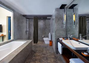 Koupelna v ubytování Viva Dash Hotel Seminyak