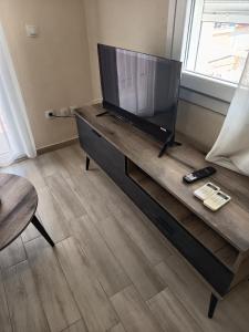 Televisyen dan/atau pusat hiburan di Regina Apartment A