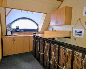 Kuchyň nebo kuchyňský kout v ubytování PROMYK - Apartamenty & Pokoje - dla dorosłych